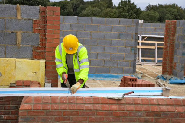 Bricklayer building wall