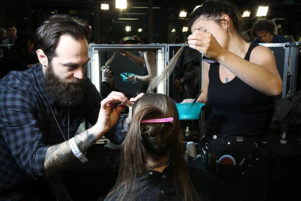 Stylist coloring hair