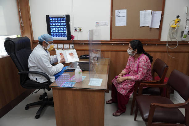 Gastroenterologist consulting patient