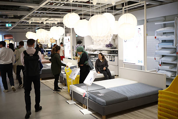 Customers browsing furniture showroom