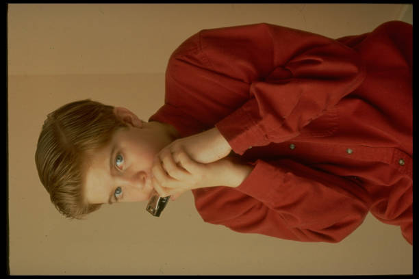 Student playing harmonica