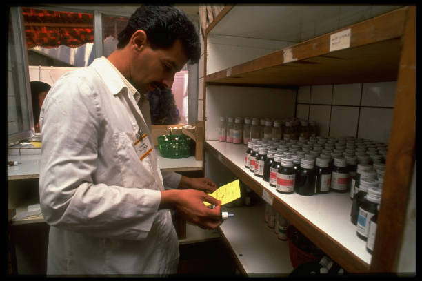 Pharmacist filling prescription