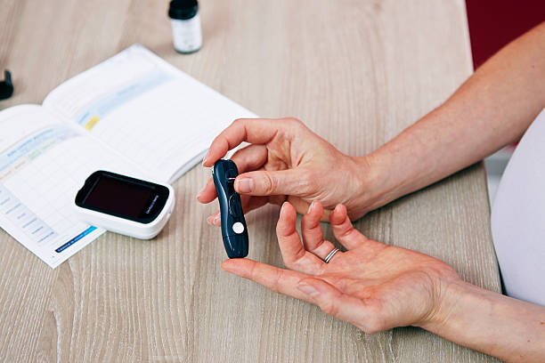 Doctor checking glucose