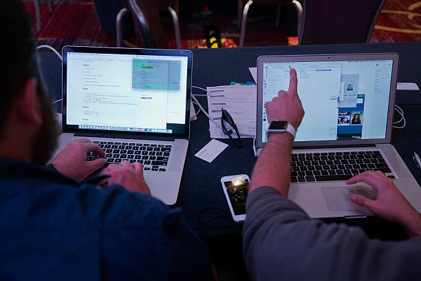 Developer coding on laptop
