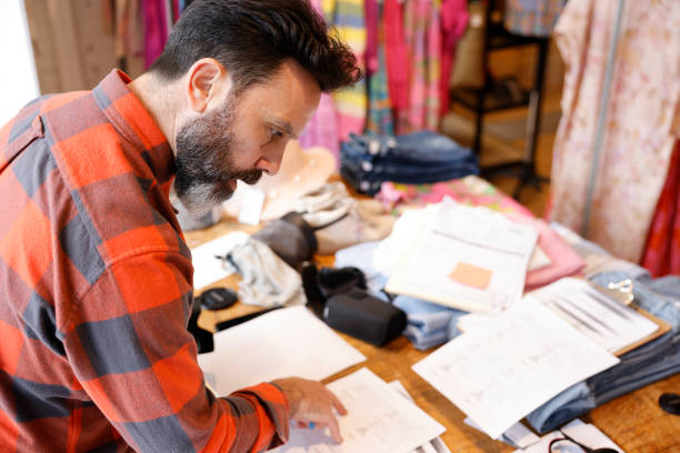 Business owner reviewing invoices