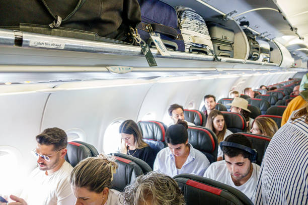 Travelers boarding airplane