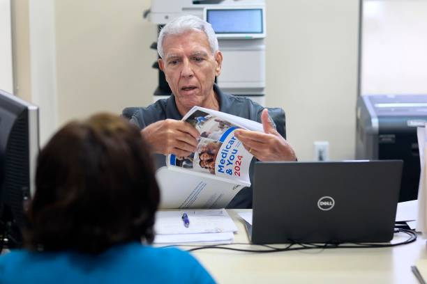Senior reviewing Medicare card