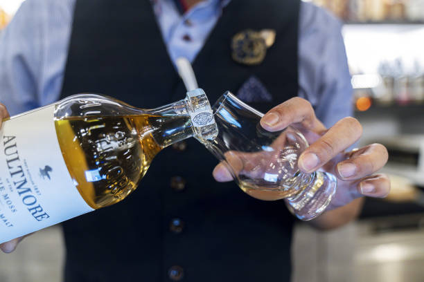 Bartender pouring whiskey