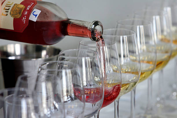 Caterer pouring wine