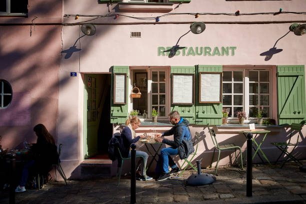 Couple reading sidewalk menu