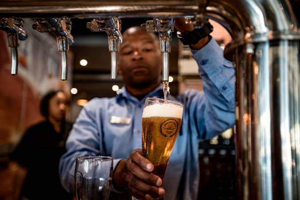 Bartender pouring pint