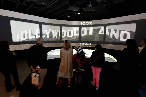 Visitors viewing film exhibits