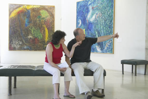 Couple viewing paintings